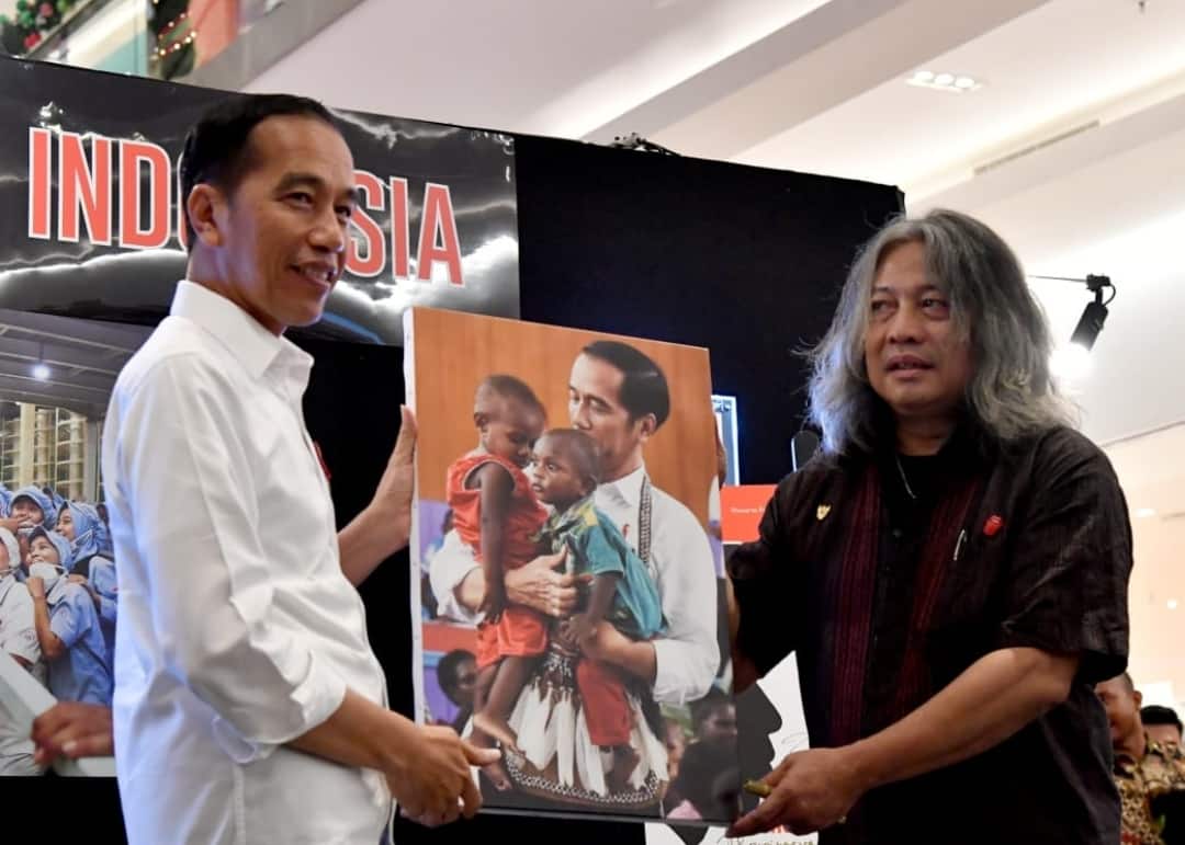 Hadiri Pameran Foto Membangun Indonesia, Jokowi Terkesan Foto Papua