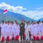 Ketika Merah Putih Mengibarkan Harapan Rakyat di Langit Kiwirok